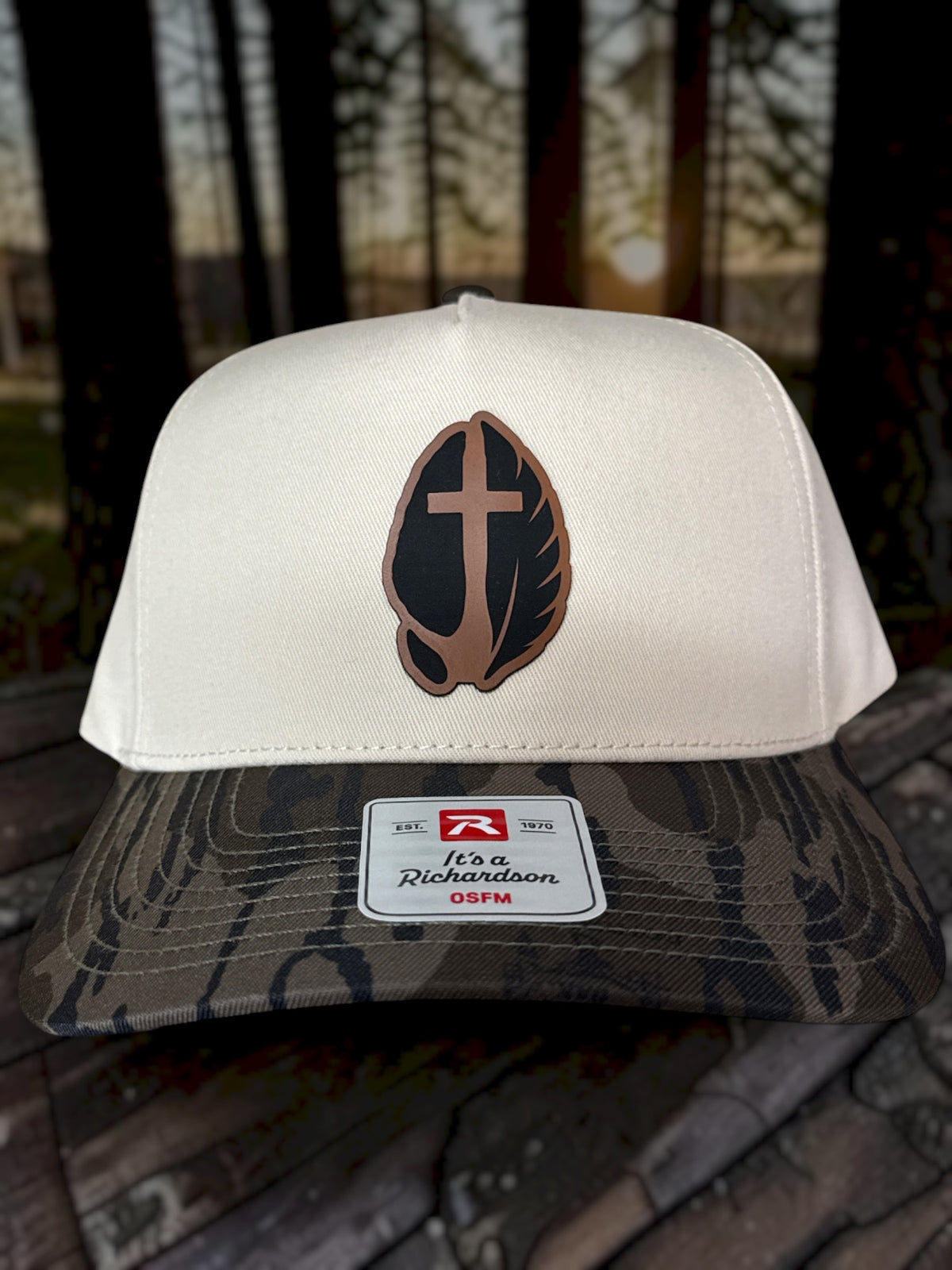Hoof & Feather Richardson hat with light front, dark camouflage brim, and brown and black patch